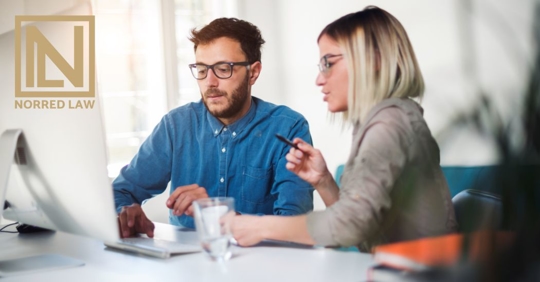 business owner talking to his attorney