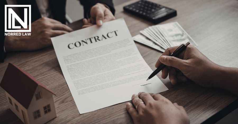 person signing business contract